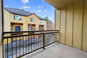 Private balcony with covered outdoor space at Glisan Townhomes