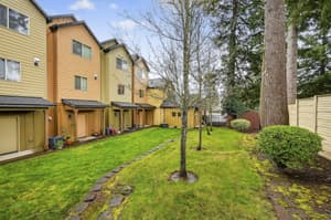 Pet-friendly townhome community with landscaped grounds at Glisan Townhomes